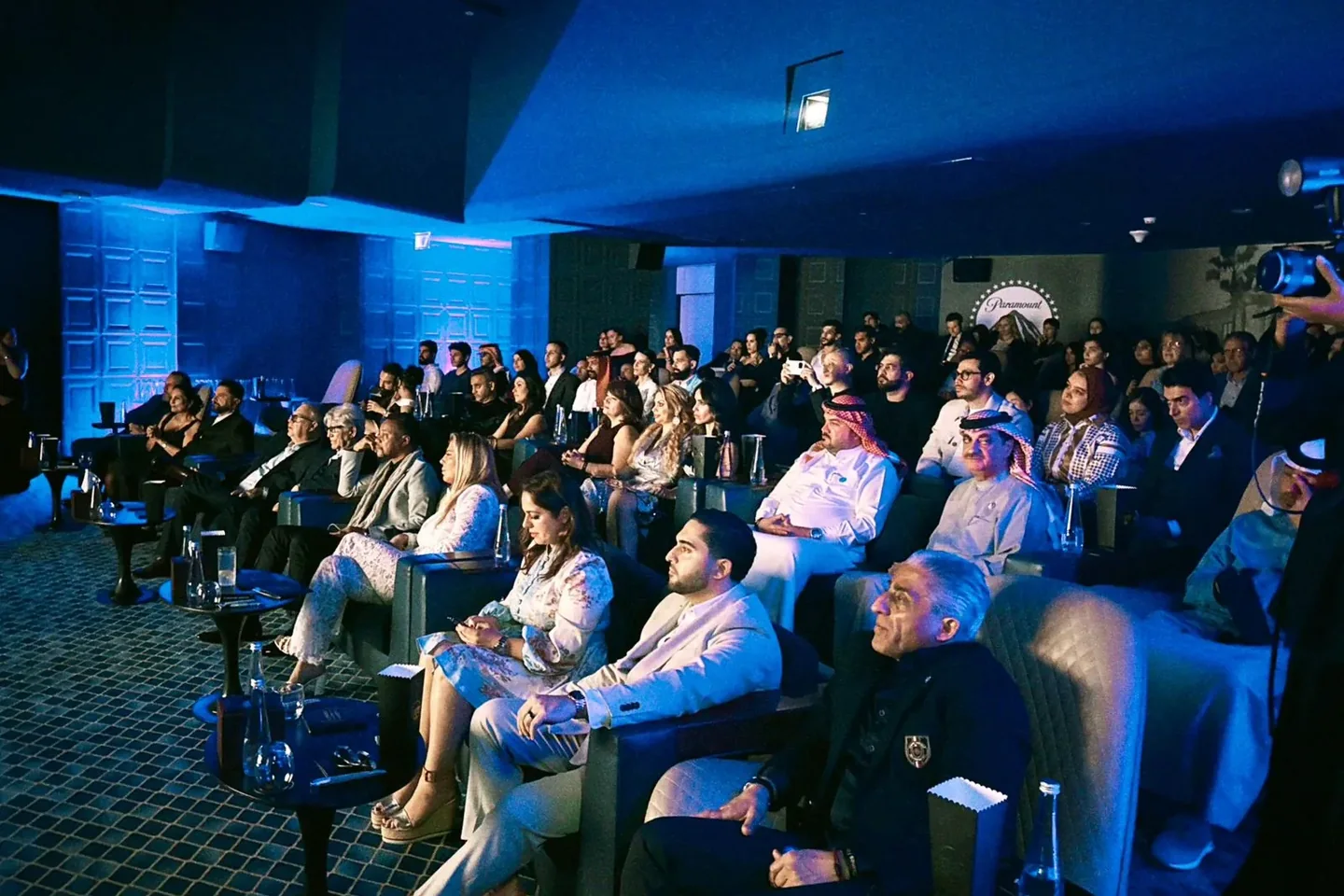 A full auditorium watching a Golden Dunes screening